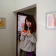 Zhao Yuqing uses her mobile phone at her apartment before leaving in Beijing on Jan. 25, 2017.